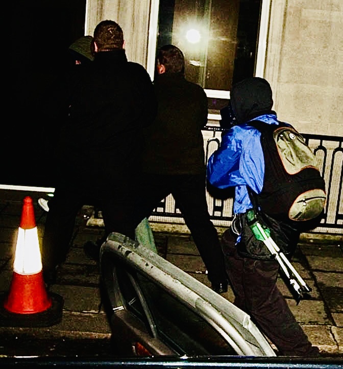 Intervention

Security and fellow photographers intervene almost immediately, pulling the Prince back from the situation before it escalates further.