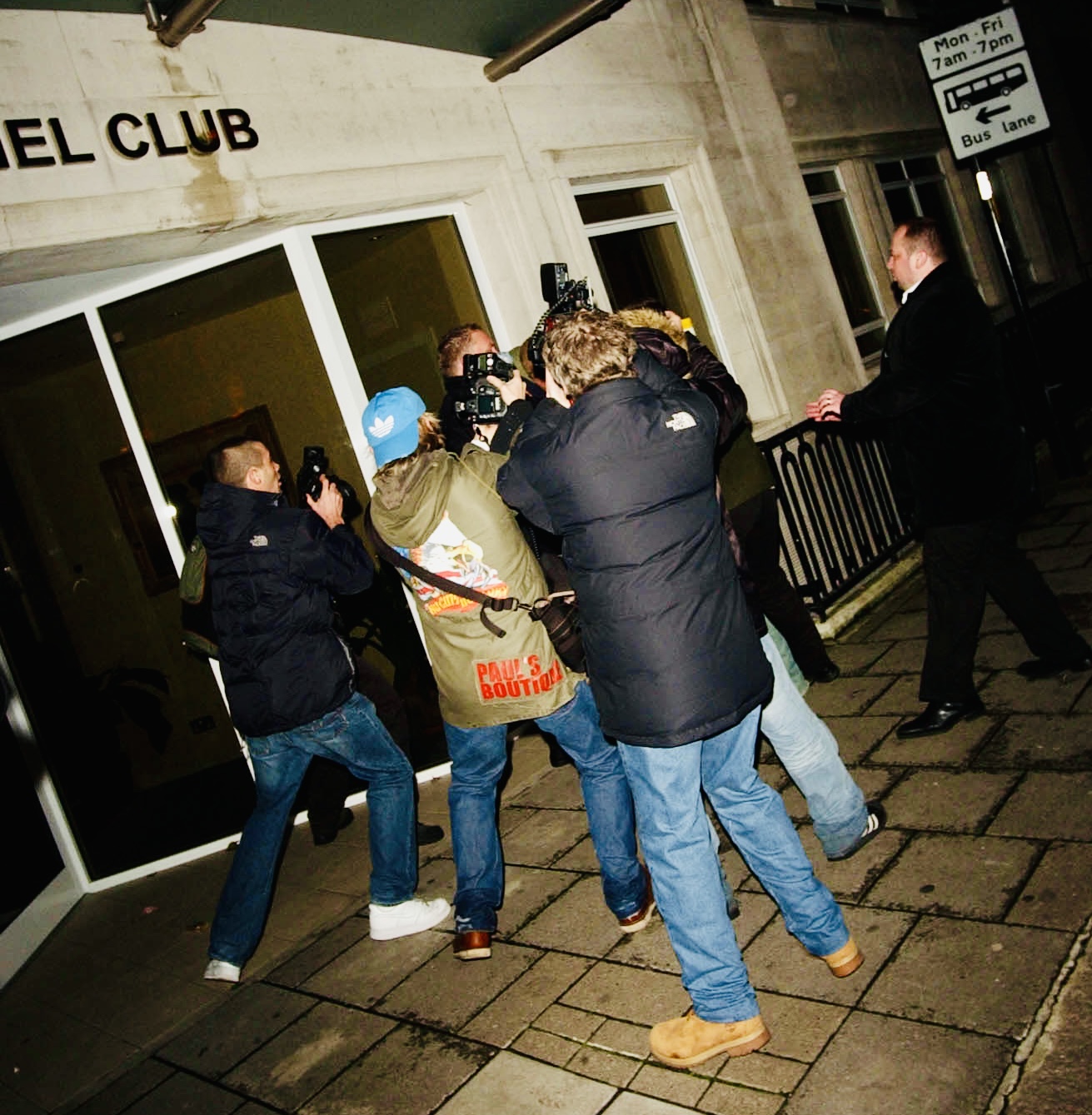 Containment 

The scene stabilises. Those present continue working professionally while security regains control. The incident lasts seconds, not minutes.